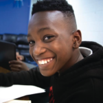 black student smiling at camera