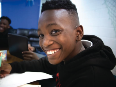 black student smiling at camera
